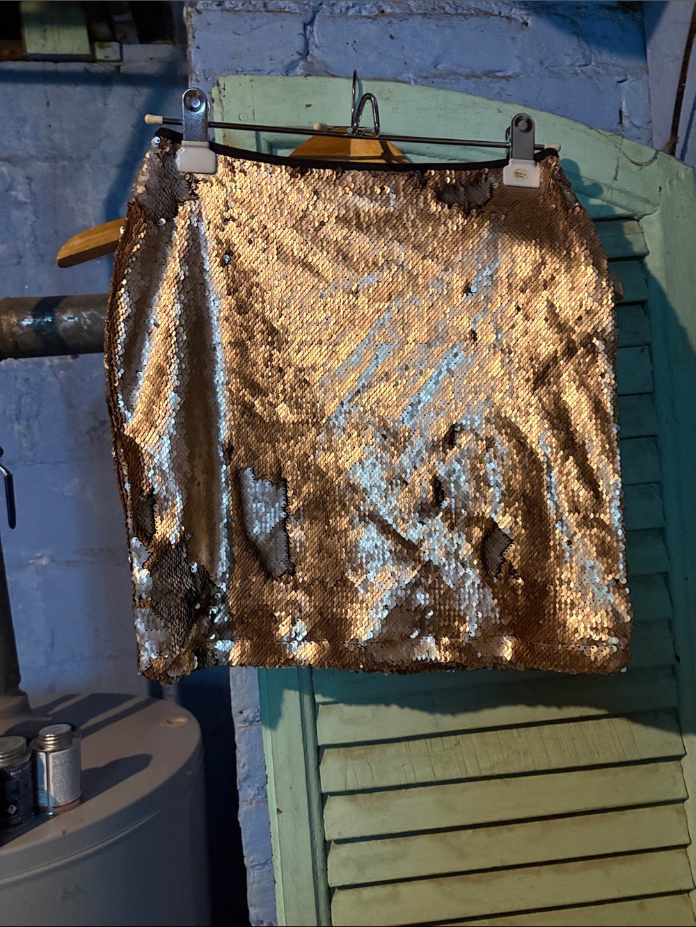 Stretchy body con mini skirt with 2 way sequins between gold and silver